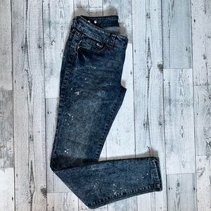 CAbi skinny Jeans with bleach look and dark wash. Size 2